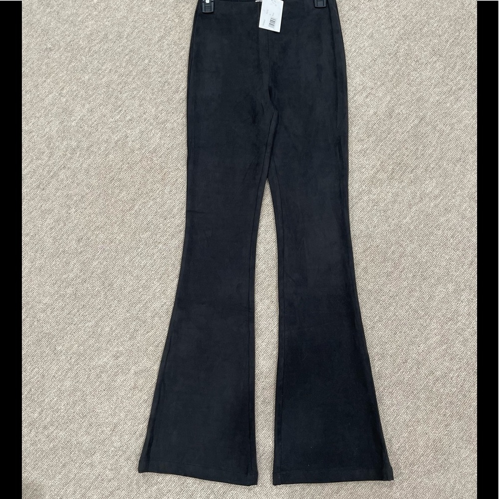 Suede flair legged pants in black size M. Flattering ! NWT